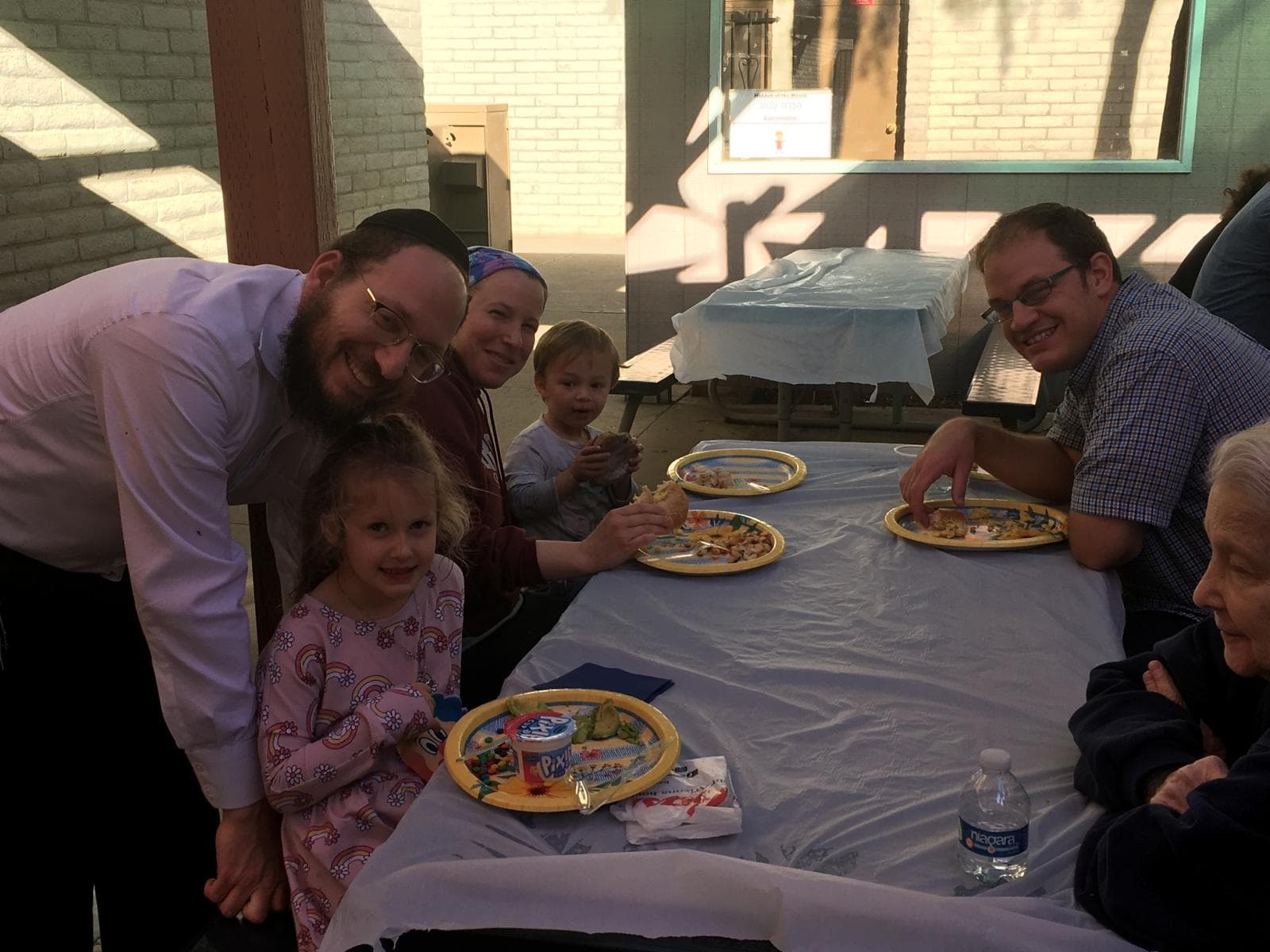 A family at a community meal